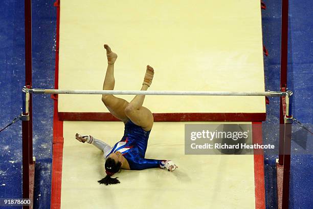 Beth Tweddle of Great Britain competes in the uneven bars during the second day of the Artistic Gymnastics World Championships 2009 at O2 Arena on...