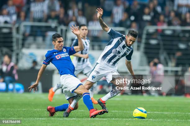 Jonathan Urretaviscaya of Monterrey fights for the ball with Walter Montoya of Cruz Azul during the 7th round match between Monterrey and Cruz Azul...