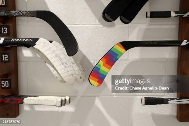 Sticks are covered with Pride Tape in honor of Hockey Is For Everyone night, prior to the game between the Chicago Blackhawks and the Anaheim Ducks,...