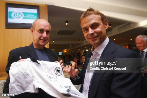 Olaf Thon gives autographs during the honourations of the DFB Award Club 100 at the restaurant Raute at the HSH Nordbank Arena Hamburg on October 14,...