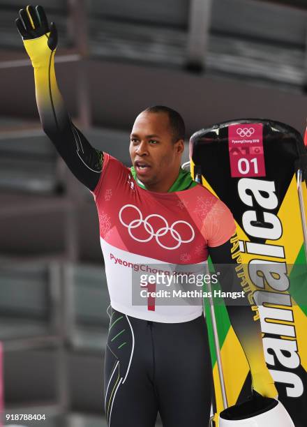 Anthony Watson of Jamaica reacts in the finish area during the Men's Skeleton heats at Olympic Sliding Centre on February 16, 2018 in...