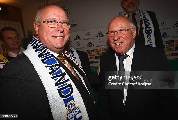 Uwe Seeler speaks to a honoured person of a regional German Football organisation of BadenWuerttemberg during the DFB Award Club 100 at the...