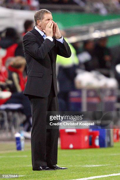 Head coach Stuart Baxter of Finland issues instructions during the FIFA 2010 World Cup Group 4 Qualifier match between Germany and Finland at the...