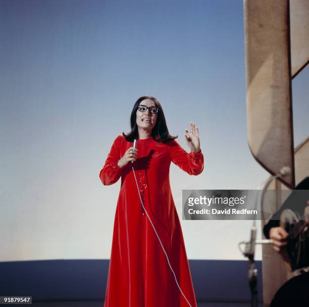 Greek singer Nana Mouskouri performs on her own BBC television show 'Nana Mouskouri' at BBC Television Centre in London circa 1971.