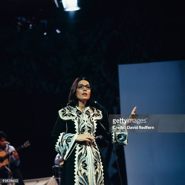 Greek singer Nana Mouskouri performs on her own BBC television show 'Nana Mouskouri' at BBC Television Centre in London circa 1972.