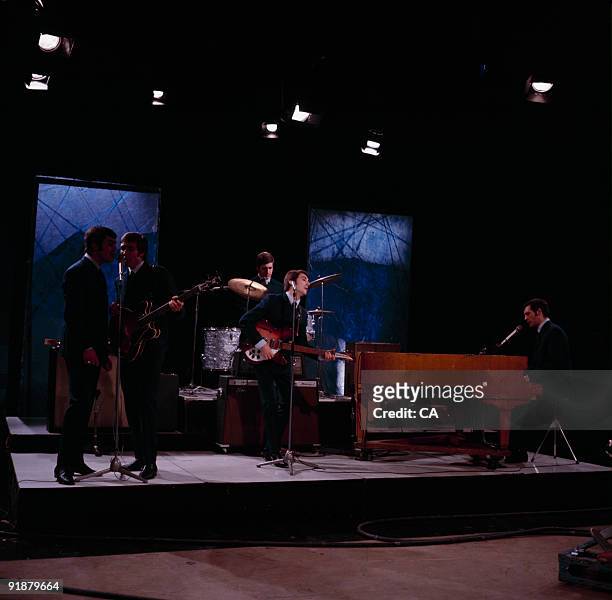 Ray Thomas, Clint Warwick, Graeme Edge, Denny Laine and Mike Pinder of the Moody Blues perform on 'Ready Steady Go' television show filmed in London,...