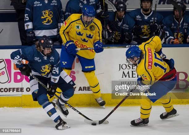 Kaapo Kakko of the Finland Nationals battles for the puck with Filip Hallander of the Sweden Nationals during the 2018 Under-18 Five Nations...
