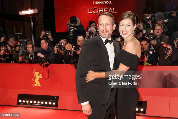 German actor Wotan Wilke Moehring and his partner Cosima Lohse attend the Opening Ceremony & 'Isle of Dogs' premiere during the 68th Berlinale...
