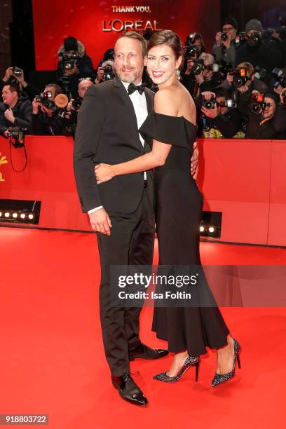 German actor Wotan Wilke Moehring and his partner Cosima Lohse attend the Opening Ceremony & 'Isle of Dogs' premiere during the 68th Berlinale...