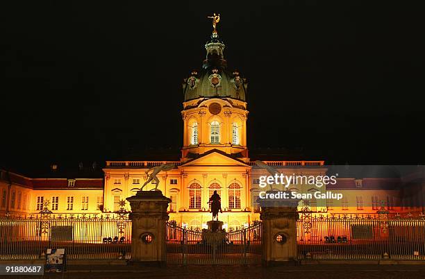 Coloured lights illuminate Schloss Charlottenburg palace as part of the Festival of Lights on October 14, 2009 in Berlin, Germany. Lighting artists...