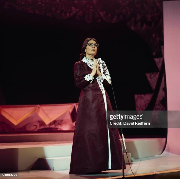 Greek singer Nana Mouskouri performs on her own BBC television show 'Nana Mouskouri' at BBC Television Centre in London circa 1972.