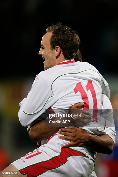 Wales' David Vaughan and Jermaine Easter react after first goal against Liechtenstein during their World Cup 2010 qualifier football game on October...