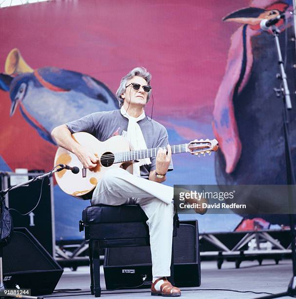 John McLaughlin performs on stage at the Jazz A Vienne Festival held in Vienne, France in July 1996.