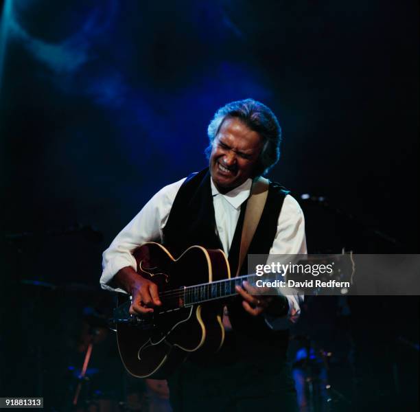 John McLaughlin performs on stage at the Jazz A Vienne Festival held in Vienne, France in July 1998.