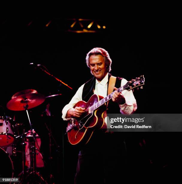 John McLaughlin performs on stage at the Jazz A Vienne Festival held in Vienne, France in July 1998.