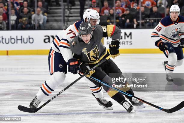 Oscar Klefbom of the Edmonton Oilers defends Jonathan Marchessault of the Vegas Golden Knights during the game at T-Mobile Arena on February 15, 2018...