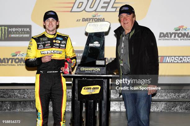 Ryan Blaney, Team Penske, Menards/Peak Ford Fusion and John Menard celebrate winning the Can-Am Duels Monster Energy NASCAR Cup Series race on...