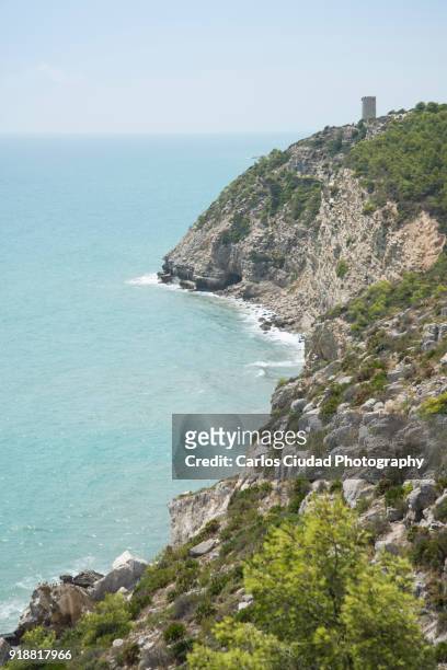 vertical shot of the coastline between alcossebre and peniscola, castellon, spain - costa_del_azahar stock pictures, royalty-free photos & images
