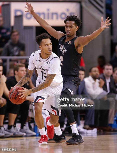 Cane Broome of the Cincinnati Bearcats holds the ball against Terrell Allen of the UCF Knights at BB&T Arena on February 6, 2018 in Highland Heights,...