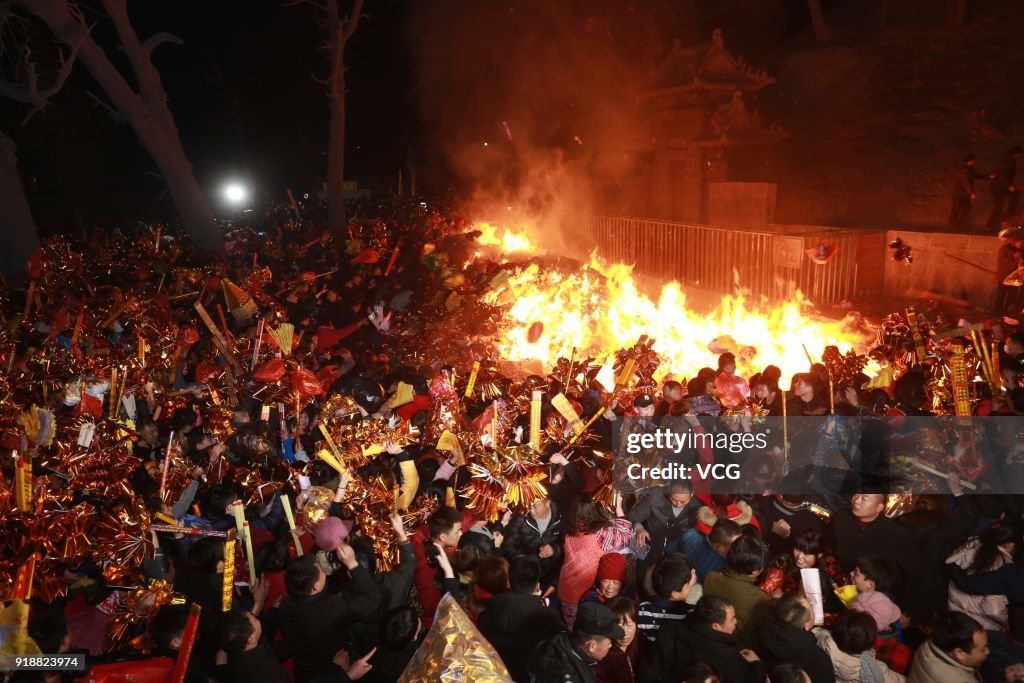 Chinese Pray With Incense Sticks To Mark New Year