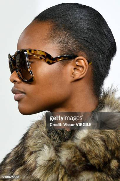 Model walks the runway at the Michael Kors Ready to Wear Fall/Winter 2018-2019 fashion show during New York Fashion Week on February 14, 2018 in New...