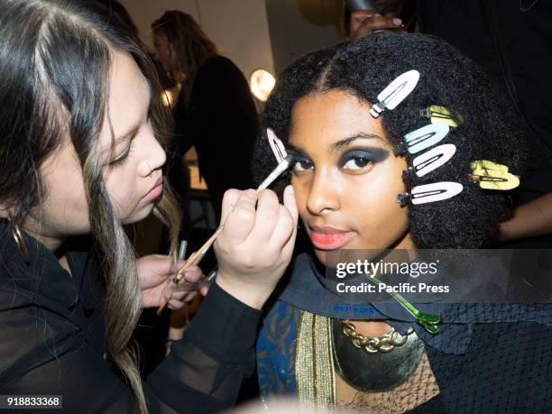 Model prepares backstage for Leanne Marshall Fall/Winter 2018 runway show during New York Fashion Week at Spring Studios, Manhattan.