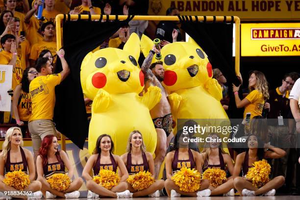 The 'Curtain of Distraction' performs during the second half of the college basketball game between the Arizona State Sun Devils and the Arizona...