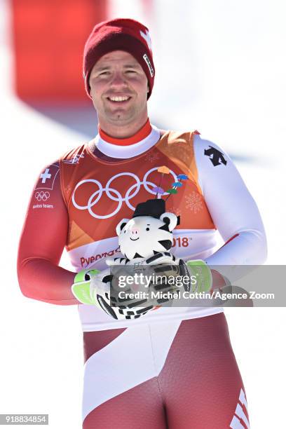 Beat Feuz of Switzerland wins the silver medal during the Alpine Skiing Men's Super-G at Jeongseon Alpine Centre on February 16, 2018 in...