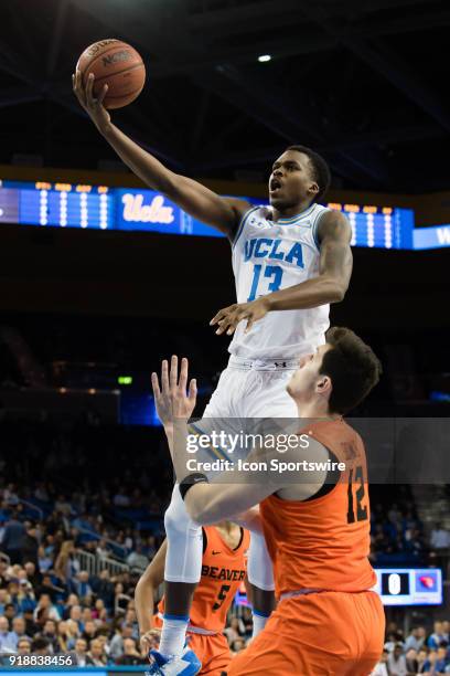 Bruins guard Kris Wilkes goes for a layup against Oregon State Beavers forward Drew Eubanks during the game between the Oregon State Beavers and the...