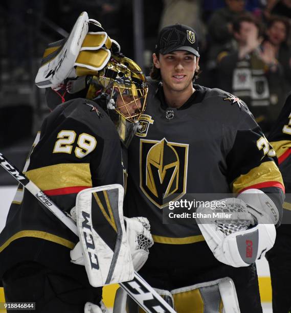 Marc-Andre Fleury and Maxime Lagace of the Vegas Golden Knights celebrate on the ice after the Golden Knights' 4-1 victory over the Edmonton Oilers...