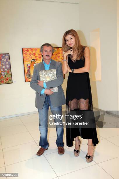 Dr.Gulnara Karimova chairwoman of the Board of Trustees,fund ForumPainter Akmal Nur visiting the Akmal Nur Exhibition opening at The Center of...