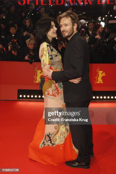 Jasmin Tabatabai and Andreas Pietschmann attend the Opening Ceremony & 'Isle of Dogs' premiere during the 68th Berlinale International Film Festival...