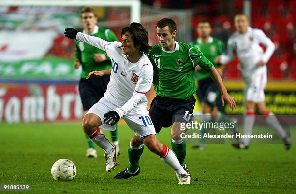Tomas Rosicky of Czech Republic and Nial McGinn of Northern Ireland battle for the ball during the FIFA 2010 World Cup Group 3 Qualifier match...