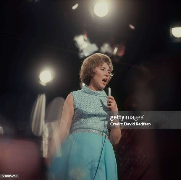 English singer Vera Lynn performs on a television show in London circa 1965.