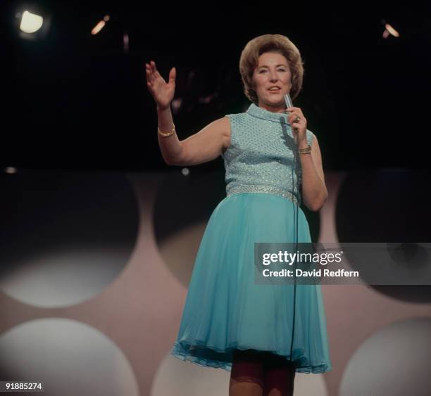 English singer Vera Lynn performs on a television show in London circa 1965.