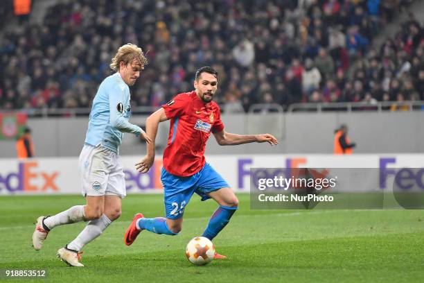Lazio's Dusan Basta vs Steaua'a Valerica Gaman during UEFA Europa League Round of 32 match between Steaua Bucharest and Lazio at the National Arena...