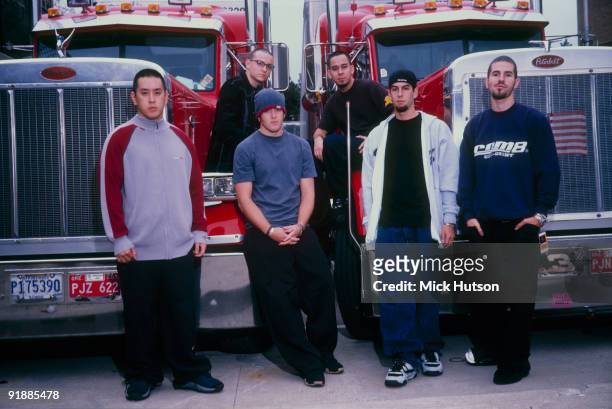 Posed group portrait of Linkin Park. Left to right are Joe Hahn, Chester Bennington, David 'Phoenix' Farrell, Mike Shinoda, Rob Bourdon and Brad...