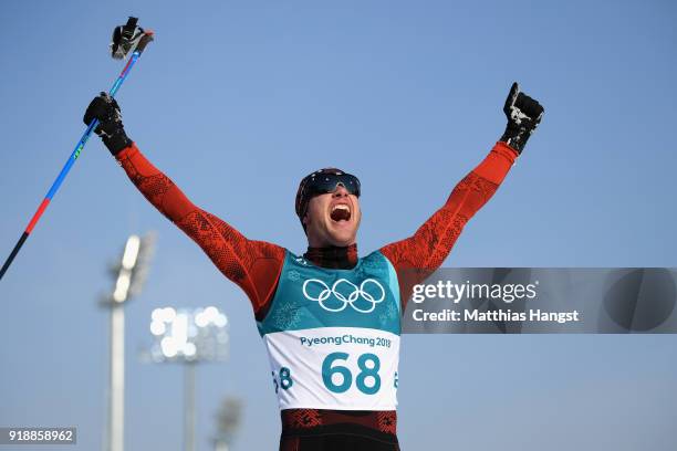Dario Cologna of Switzerland reacts as he crosses the finish line during the Cross-Country Skiing Men's 15km Free at Alpensia Cross-Country Centre on...