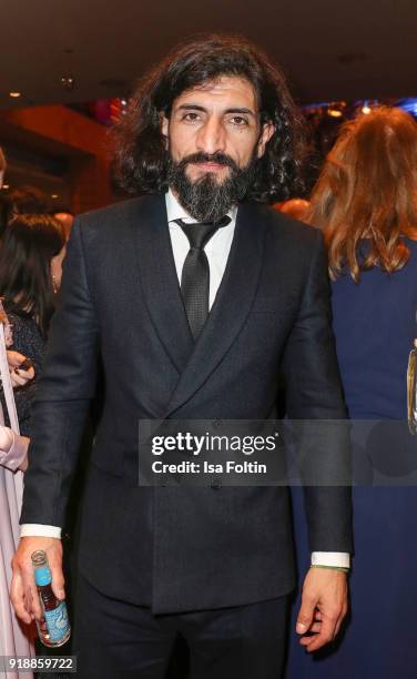 German actor Numan Acar attends the opening party of the 68th Berlinale International Film Festival Berlin at Berlinale Palace on February 15, 2018...