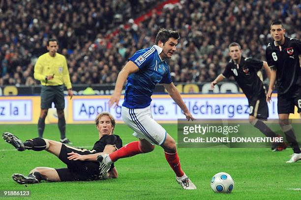 French Andre Pierre Gignac vies with Austrian Jurgen Patocka during the World Cup 2010 qualifying football match France vs. Austria on October 14,...