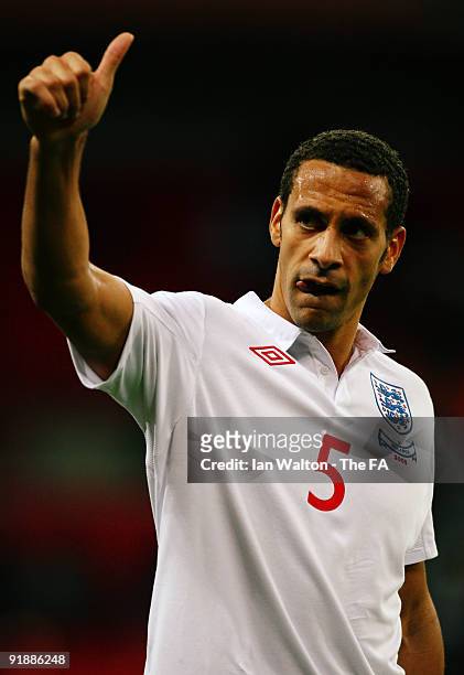 Rio Ferdinand of England waves after winning the FIFA 2010 World Cup Group 6 Qualifying match between England and Belarus at Wembley Stadium on...