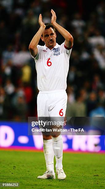 John Terry of England applauds the fans after winning the FIFA 2010 World Cup Group 6 Qualifying match between England and Belarus at Wembley Stadium...