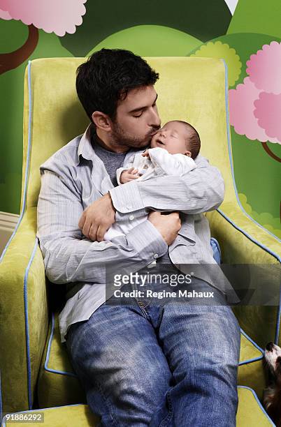 Jordan Bratman, Christina Aguilera's husband, poses with their son Max Liron Bratman on February 9, 2008 in their Los Angeles, California home.