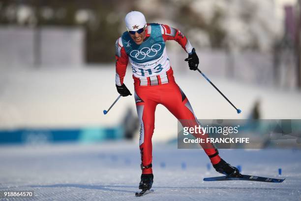 Morocco's Samir Azzimani competes during the men's 15km cross country freestyle at the Alpensia cross country ski centre during the Pyeongchang 2018...