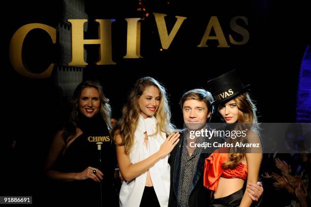 Models Judit Masco, Martina Klein, designer Baruc Corazon and model Clara Alonso attends Smoking Chivas Show at the Chivas Estudio on October 14,...