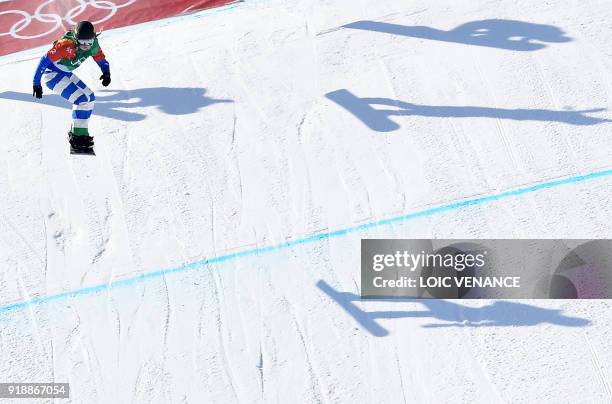 Italy's Michela Moioli competes to win the final of the women's snowboard cross semi-final at the Phoenix Park during the Pyeongchang 2018 Winter...