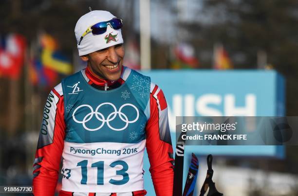 Morocco's Samir Azzimani reacts after finishing in the men's 15km cross country freestyle at the Alpensia cross country ski centre during the...