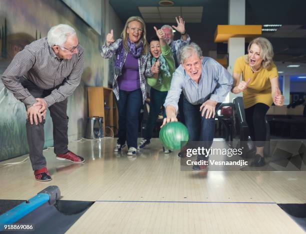 bowling - senior men bowling stock pictures, royalty-free photos & images