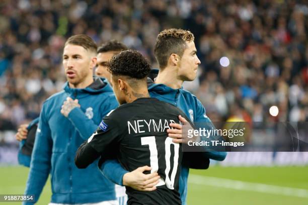 Cristiano Ronaldo of Real Madrid and Neymar of Paris looks on during the UEFA Champions League Round of 16 First Leg match between Real Madrid and...