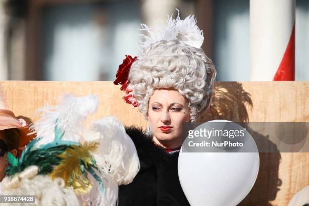 People wearing carnival costumes attend the event of the Eagle Flight on February 11, 2018 in Venice, Italy. The theme for the 2018 edition of Venice...